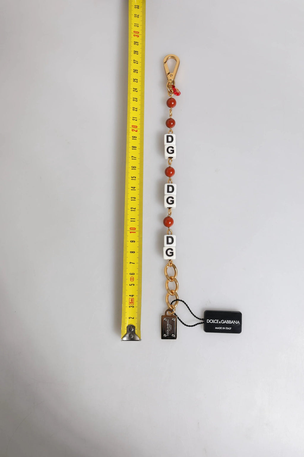Dolce & Gabbana Multicolor Gold Tone Brass Chain DG Logo Dice Bracelet by Dolce & Gabbana
