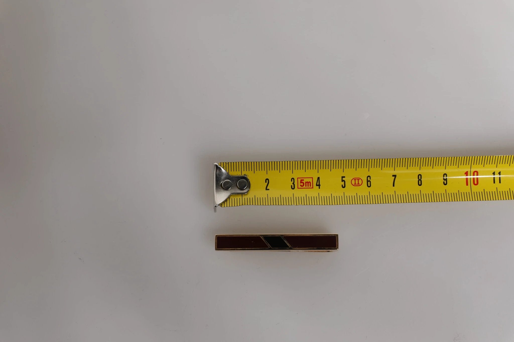 Dolce & Gabbana Multicolor Gold Tone Brass Tie Clip Bar by Dolce & Gabbana