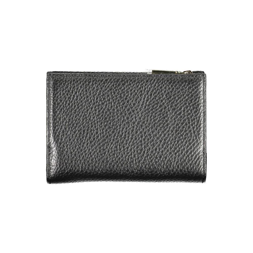 Portefeuille femme en cuir noir Coccinelle
