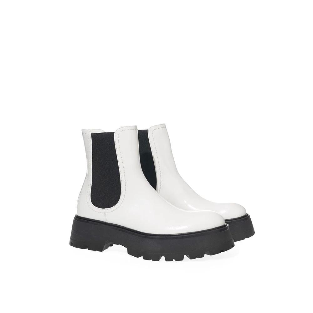 Alexander McQueen Black And White Leather Chelsea Boots by Alexander McQueen