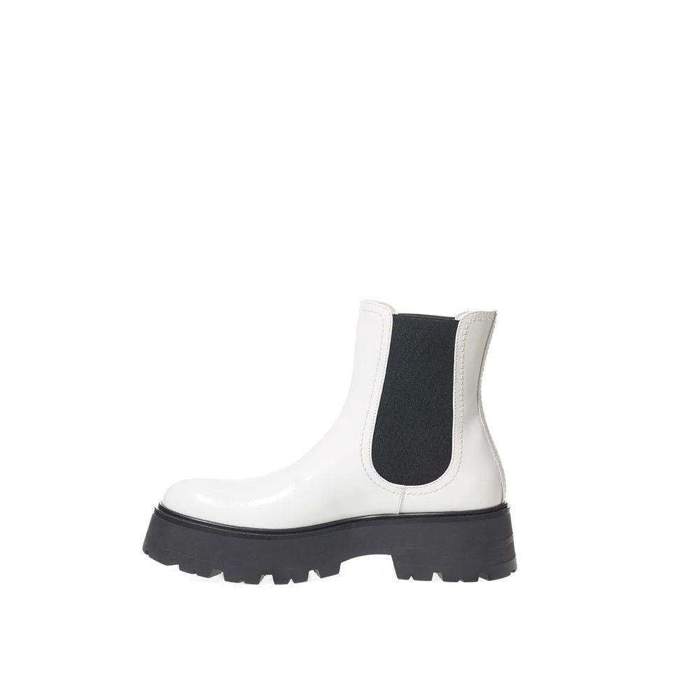 Alexander McQueen Black And White Leather Chelsea Boots by Alexander McQueen