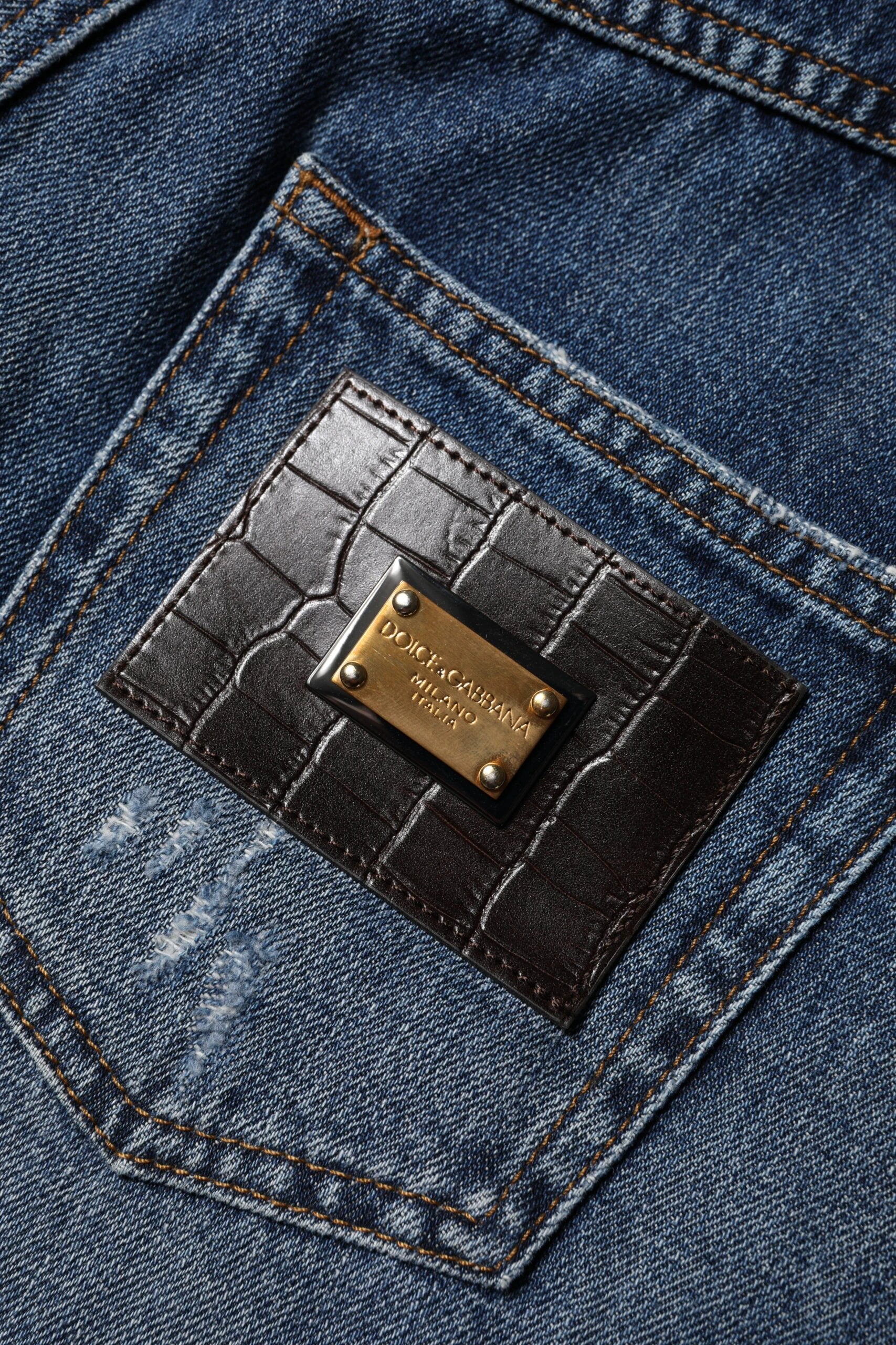Dolce & Gabbana Blue Cotton Tattered Denim Bermuda Shorts by Dolce & Gabbana