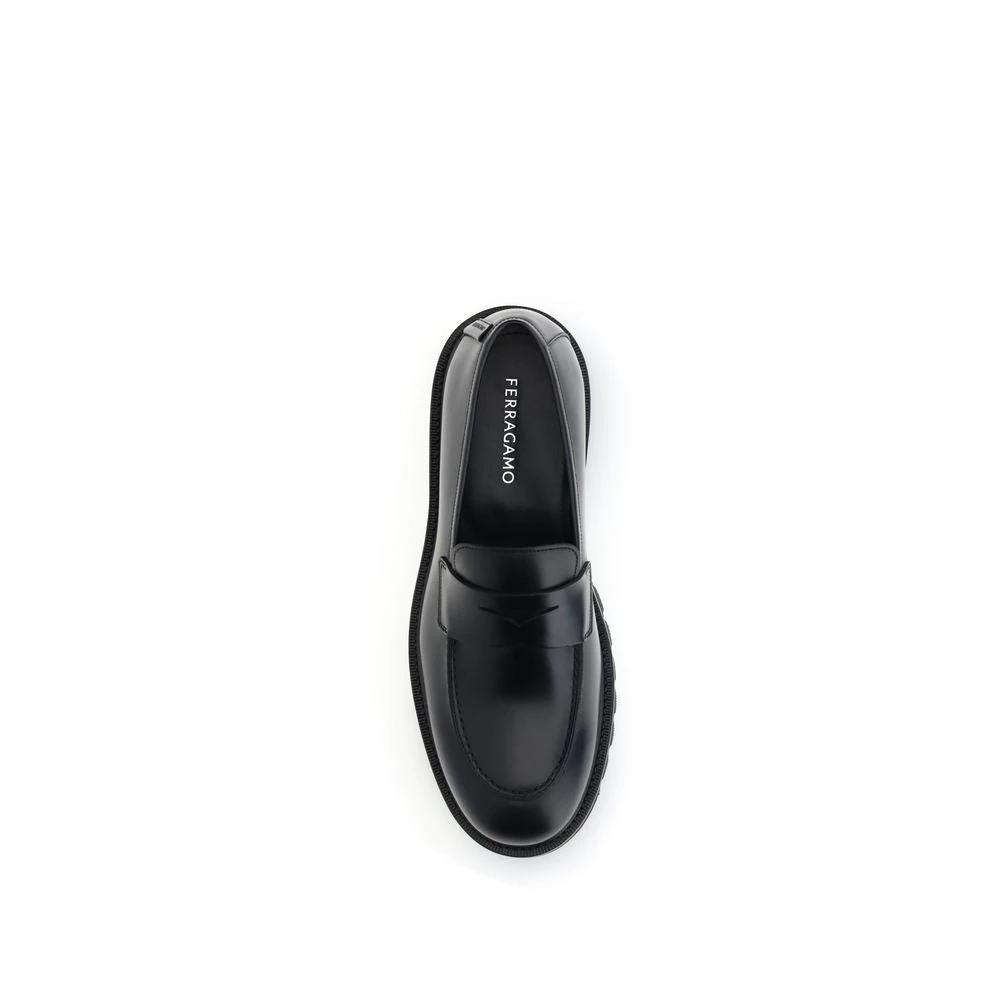 Ferragamo Black Rubber Slip-On Loafers by Ferragamo
