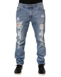 Dolce & Gabbana Blue Tattered Slim Fit Cotton Denim Jeans by Dolce & Gabbana