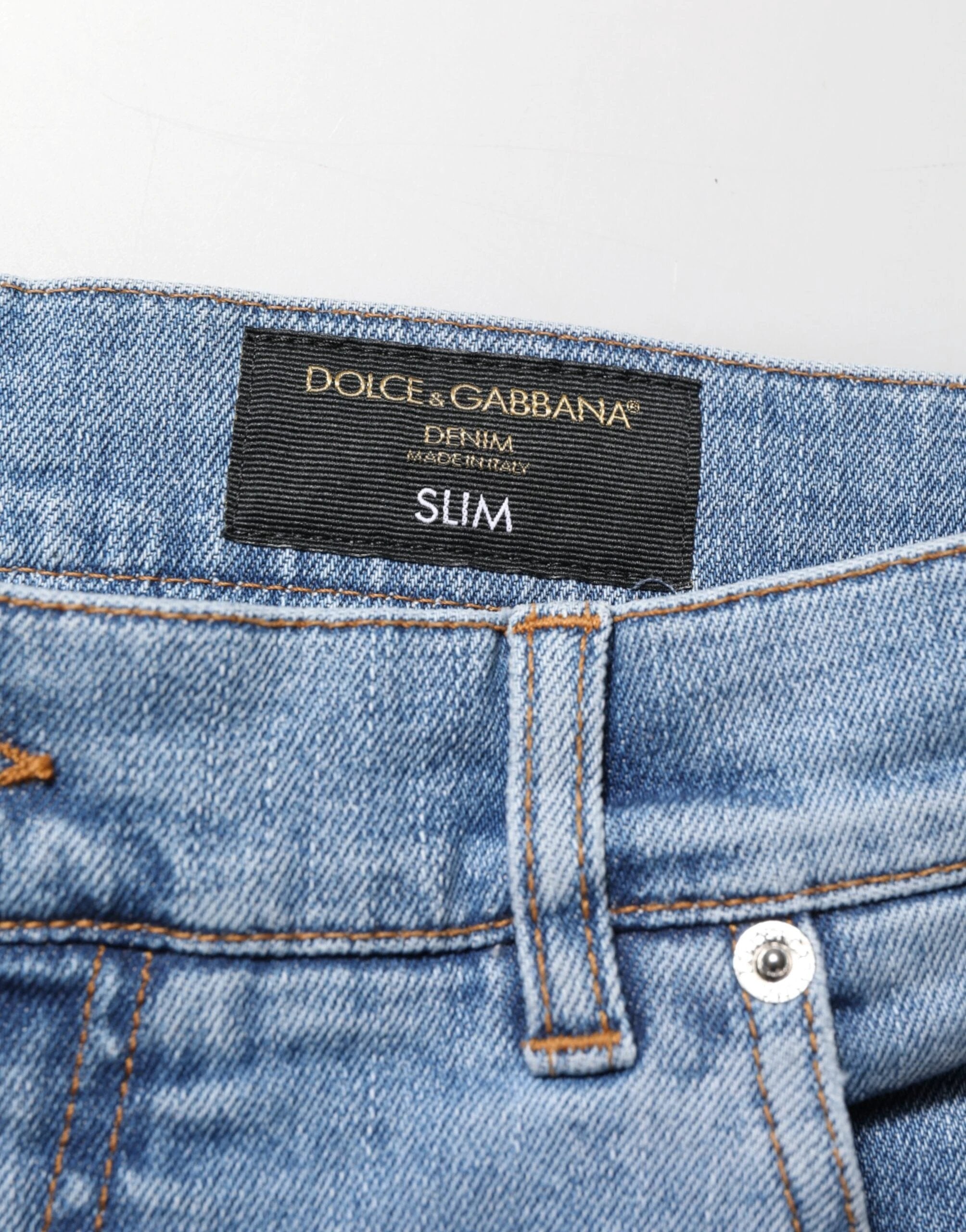 Dolce & Gabbana Blue Tattered Slim Fit Cotton Denim Jeans by Dolce & Gabbana