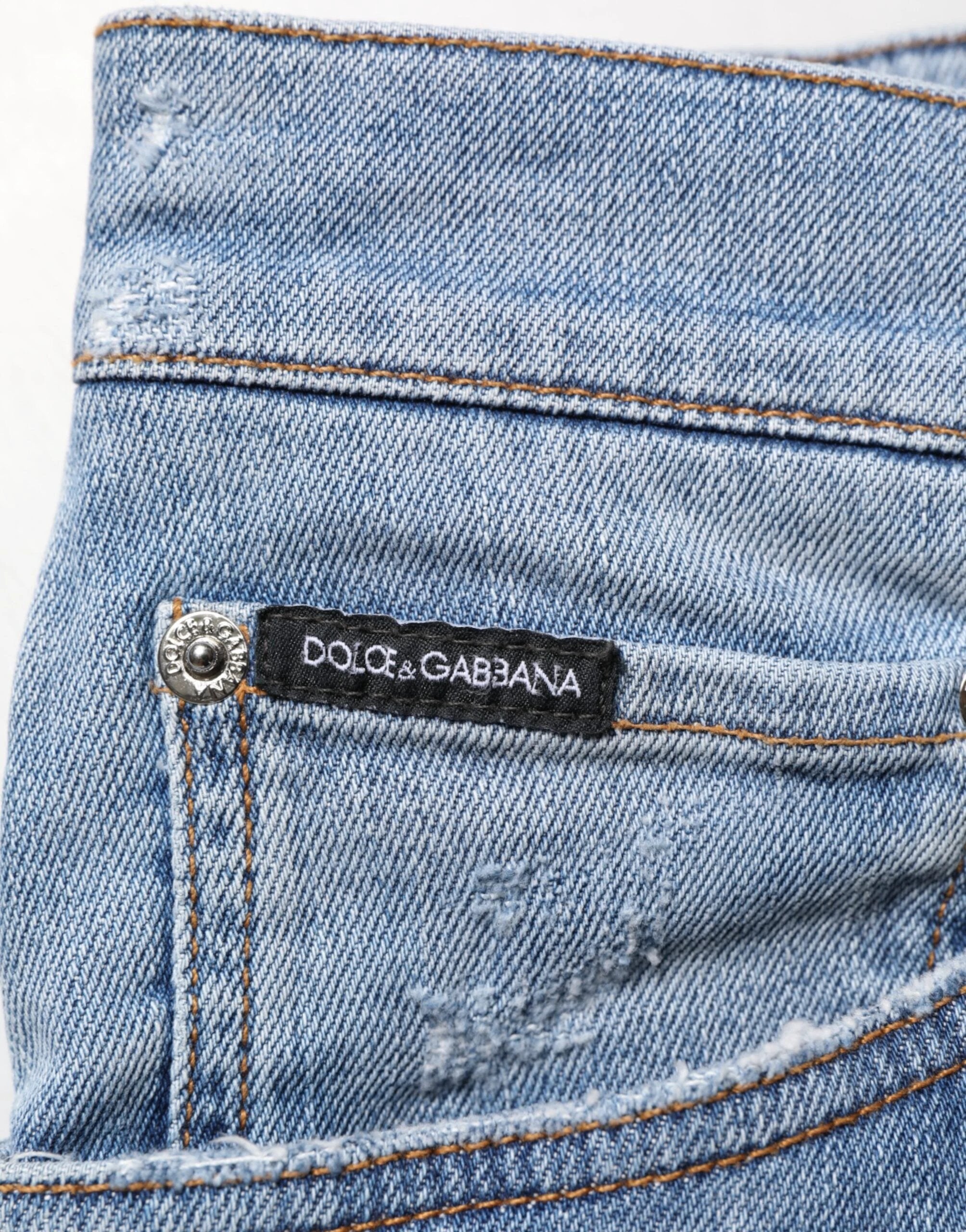 Dolce & Gabbana Blue Tattered Slim Fit Cotton Denim Jeans by Dolce & Gabbana