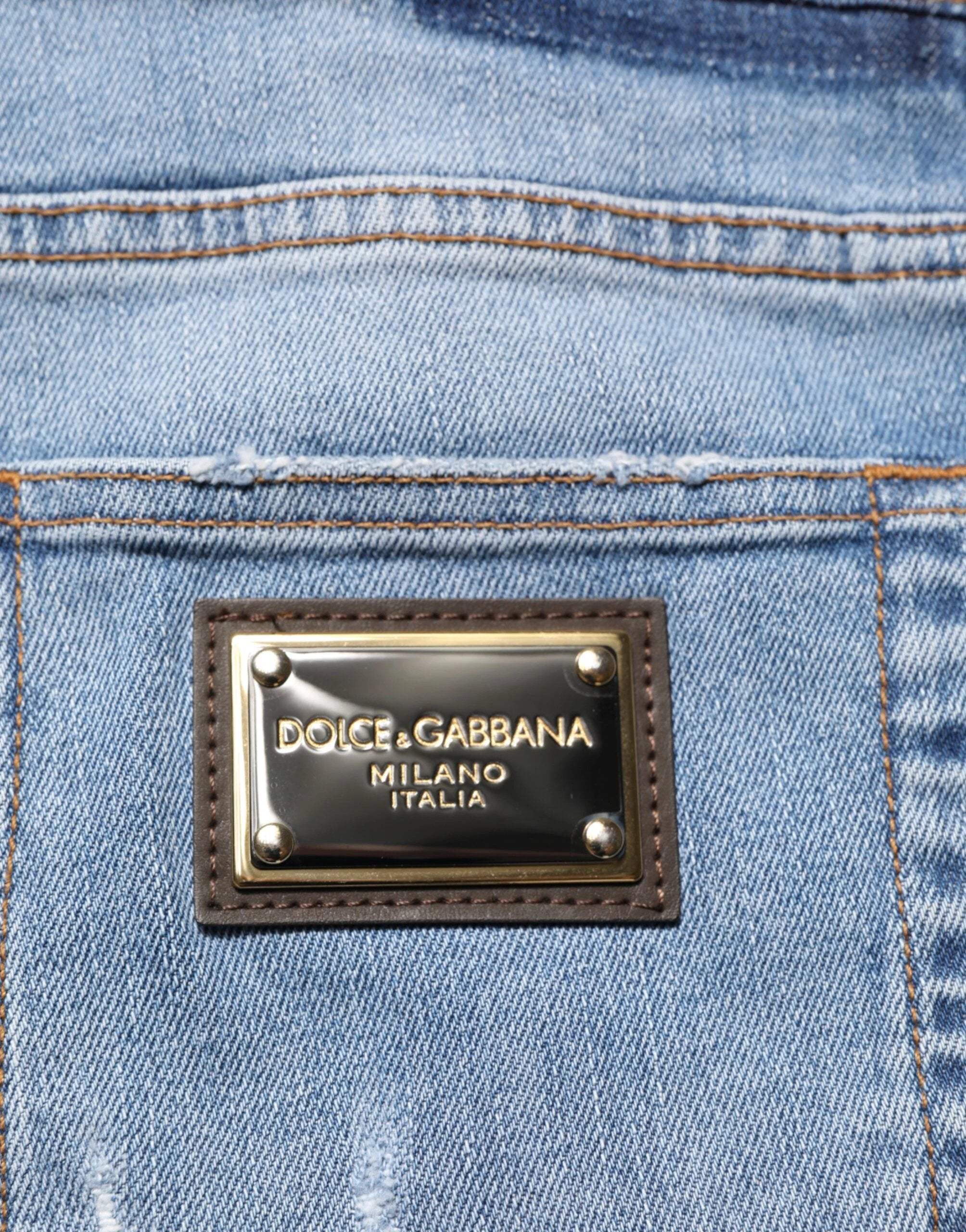 Dolce & Gabbana Blue Tattered Slim Fit Cotton Denim Jeans by Dolce & Gabbana
