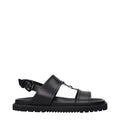 Sandales plates Versace en cuir noir