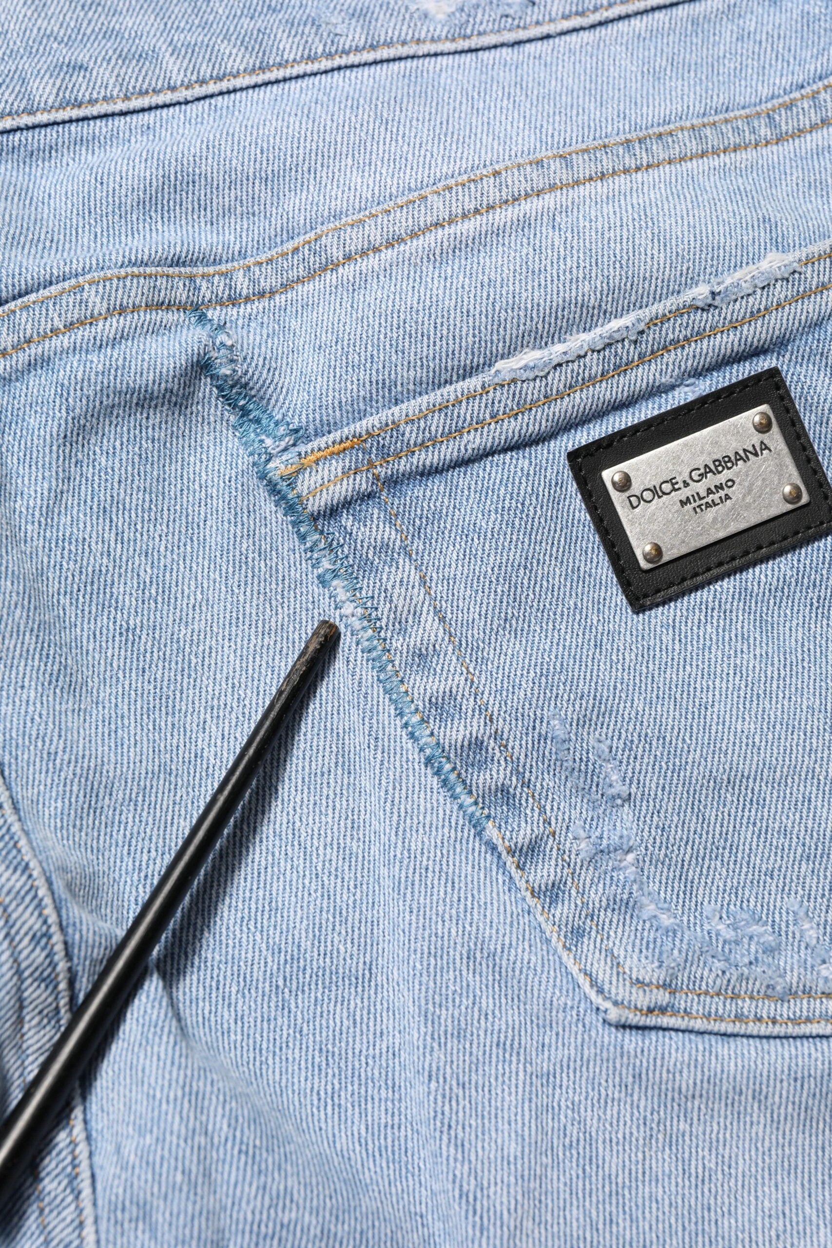 Dolce & Gabbana Blue Cotton Distressed Slim Fit Denim Jeans by Dolce & Gabbana