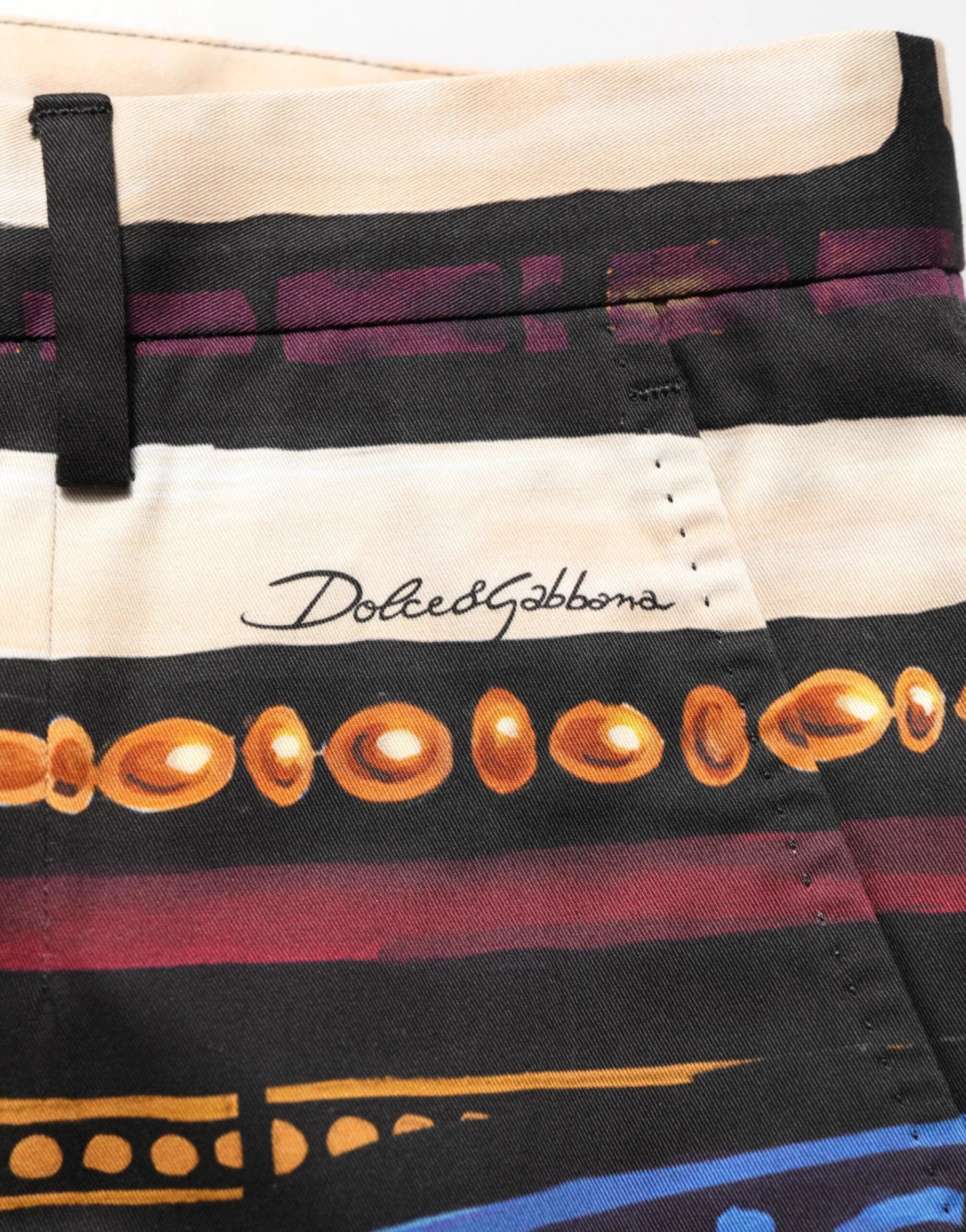 Dolce & Gabbana Multicolor Julias Ceasar Print Tapered Pants by Dolce & Gabbana